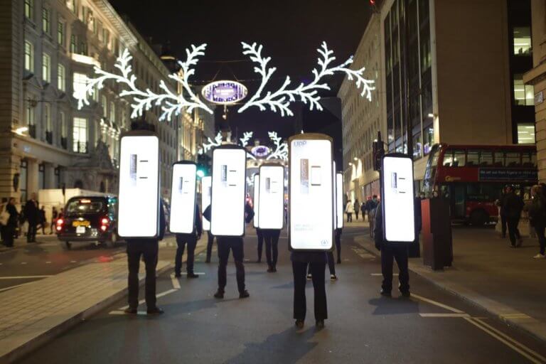 Adwalkers in London are highly visible.